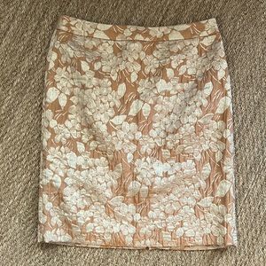slim straight pencil skirt. Size 8 worn a few times gold and cream brocade